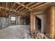 Spacious unfinished bedroom showcases beamed ceiling at 2705 Robinson Rd, Newton, NC 28658