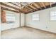 Bedroom with open walls and ceiling ready for renovation at 2705 Robinson Rd, Newton, NC 28658