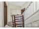 Entry hall featuring a staircase and a chair at 303 E Fisher St, Salisbury, NC 28144