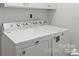 Convenient laundry area features a modern washer and dryer set at 317 S Lineberry St, Troy, NC 27371