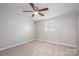 Bedroom showcasing neutral carpet, ceiling fan and one window for natural light at 3791 Richard St, Claremont, NC 28610
