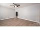 Bright living room with light wood flooring and neutral walls at 3791 Richard St, Claremont, NC 28610