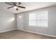 Spacious living room featuring light-toned walls and flooring and a ceiling fan at 3791 Richard St, Claremont, NC 28610