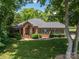 Beautiful brick home with mature trees and lush green lawn at 3964 Deer Run Ne Dr, Conover, NC 28613