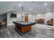 Spacious game room features a pool table, recessed lighting, and a lounge area at 3964 Deer Run Ne Dr, Conover, NC 28613