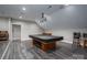 Spacious game room features a pool table, recessed lighting, and ample space for entertaining at 3964 Deer Run Ne Dr, Conover, NC 28613