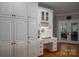 Office space with abundant cabinets and drawers, desk and natural light at 3964 Deer Run Ne Dr, Conover, NC 28613