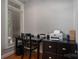 Functional office space with a desk, drawers, and a window providing natural light at 3964 Deer Run Ne Dr, Conover, NC 28613