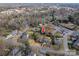 Aerial view showcases the property's location, mature trees, and proximity to the neighborhood at 418 3Rd Ne St, Hickory, NC 28601