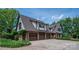 Spacious three-car garage with Tudor-style architecture and ample parking at 418 3Rd Ne St, Hickory, NC 28601