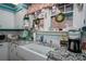 Well-lit kitchen featuring bright granite countertops, white cabinetry, stainless steel appliances and lots of decor at 418 3Rd Ne St, Hickory, NC 28601