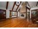 Grand living room with stone fireplace, hardwood floors, and high ceilings at 418 3Rd Ne St, Hickory, NC 28601