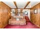 Basement sitting area with comfortable couch and open view of dining area at 4603 Oakwood Cir, Gastonia, NC 28056