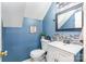 Charming blue bathroom with modern vanity, stylish mirror, and wall decor at 4603 Oakwood Cir, Gastonia, NC 28056