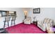 Cozy living room with chairs near kitchen bar at 4603 Oakwood Cir, Gastonia, NC 28056