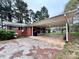 Home with attached carport, providing covered parking at 511 W Main St, Cleveland, NC 27013