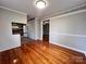 Bright dining room with rich hardwood floors is perfect for entertaining at 511 W Main St, Cleveland, NC 27013