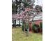Home with mature flowering tree in a landscaped front yard at 511 W Main St, Cleveland, NC 27013