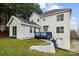 Picture of the backyard, including a sunroom, patio, and lush lawn at 5680 Gold Creek Bay None, Hickory, NC 28601