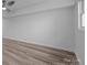 Bright bedroom with hardwood flooring, ceiling fan and a large window at 5680 Gold Creek Bay None, Hickory, NC 28601