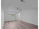 Spacious bedroom with a ceiling fan, closet, and a large window at 5680 Gold Creek Bay None, Hickory, NC 28601