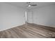 Bright bedroom with hardwood flooring, closet, and ceiling fan at 5680 Gold Creek Bay None, Hickory, NC 28601
