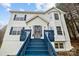 Exterior view of home with blue trim on stairs, shutters and porch at 5680 Gold Creek Bay None, Hickory, NC 28601
