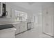 Bright white kitchen with stainless steel appliances, white countertops and white cabinetry at 5680 Gold Creek Bay None, Hickory, NC 28601