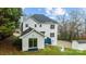 A two-story home with a deck and a finished basement, and a detached sun room in the rear at 5680 Gold Creek Bay None, Hickory, NC 28601