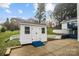The shed features a ramp, double doors, and small windows at 5680 Gold Creek Bay None, Hickory, NC 28601