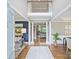 Elegant foyer with hardwood floors, high ceilings, and views into the living spaces at 6225 Woodleigh Oaks Dr, Charlotte, NC 28226
