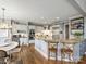 Beautiful kitchen with stainless steel appliances, granite countertops, and a breakfast bar at 6225 Woodleigh Oaks Dr, Charlotte, NC 28226