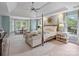 Bright, spacious main bedroom with trey ceiling, sitting area, and large windows at 6225 Woodleigh Oaks Dr, Charlotte, NC 28226