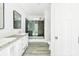 Modern bathroom with a glass enclosed shower and double sink vanity at 629 Mt. Wesley Church Rd, Hiddenite, NC 28636
