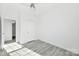 Bedroom with neutral walls, simple flooring and closet space at 629 Mt. Wesley Church Rd, Hiddenite, NC 28636