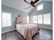 Bright bedroom featuring vaulted ceiling, large windows, and elegant decor at 630 Deese Rd, Monroe, NC 28110