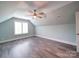 Bright and spacious bedroom with wooden floors and neutral tones, offering a blank canvas for personalization at 630 Deese Rd, Monroe, NC 28110