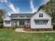 Inviting home exterior with well-kept lawn, landscaped garden, and covered porch at 630 Deese Rd, Monroe, NC 28110