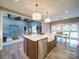 Spacious kitchen with a large island, stainless steel appliances, and an adjacent dining area at 630 Deese Rd, Monroe, NC 28110