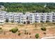 Attractive townhome community amidst lush greenery with well-maintained landscaping at 637 Williamson Rd # 304, Mooresville, NC 28117