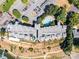 Stunning aerial view of the community, showcasing the pool, parking, and landscaping at 637 Williamson Rd # 304, Mooresville, NC 28117