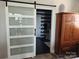 Stylish bathroom featuring blue striped walls and a modern sliding glass door for added privacy at 637 Williamson Rd # 304, Mooresville, NC 28117