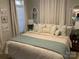 Comfortable bedroom features soft natural light and a calm, relaxing atmosphere at 637 Williamson Rd # 304, Mooresville, NC 28117