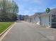 View down the street of a row of garages in a neighborhood at 637 Williamson Rd # 304, Mooresville, NC 28117