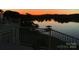 Scenic lake view from the patio with beautiful sunset colors reflecting on the water at 637 Williamson Rd # 304, Mooresville, NC 28117