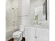 Modern bathroom with a glass-enclosed shower, marble vanity, and elegant fixtures at 6700 Folger Dr, Charlotte, NC 28270