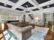 Open-concept living room with a view of the kitchen and a stylish seating area at 6700 Folger Dr, Charlotte, NC 28270