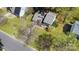Aerial view of neighborhood and road with mature trees at 8224 Park Vista Cir, Charlotte, NC 28226