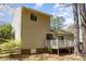 Back exterior featuring a sliding glass door leading to a weathered wooden deck at 8224 Park Vista Cir, Charlotte, NC 28226