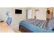 Bedroom with a TV mounted on the wall, an attached bathroom, and desk area at 8224 Park Vista Cir, Charlotte, NC 28226